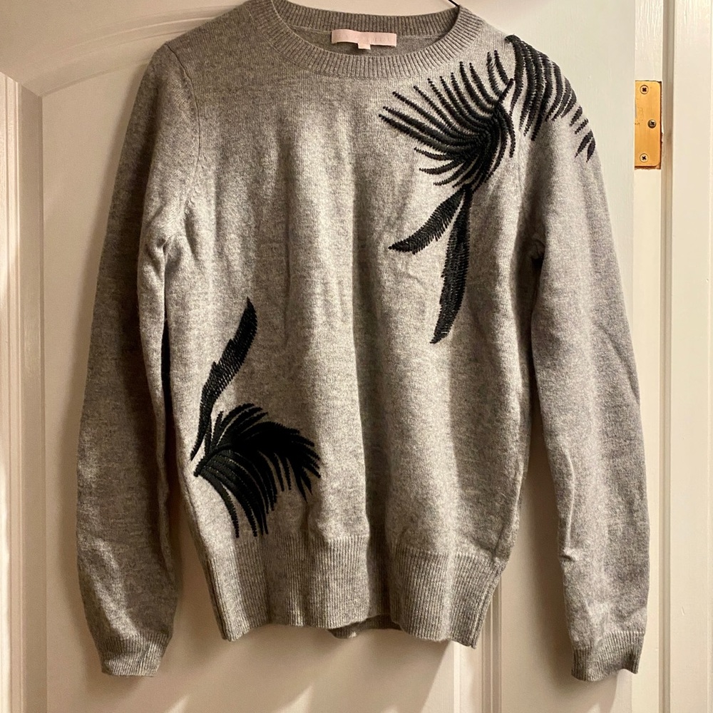 Cashmere sweater with tropical details